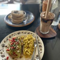 Avo Toast with scrambled tofu, chocolate smoothie, masala pancakes.  at Asa Vegan Kitchen and Studio in Chiang Mai