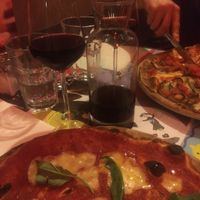 Vegan cheese on pizza at Pizzeria Piola in Treviso