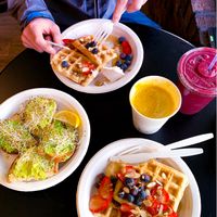 Daily wellness waffles, avocado toast, golden milk latte, açaí+berry smoothie at Plantz Cafe in Dracut