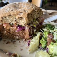 The ultimate vegan burger made with Beyond Meat. The broccoli cole slaw is the best I have ever had! The gruten bun is light and fresh, simply delicious. at Plantz Cafe in Dracut