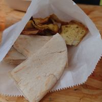 Breads that accompany vegan mezze at Falafel Corner in Cardiff