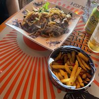 Vegan chow mein (wild mushroom and tofu) and salt and chilli chips. The tofu in this chow mein might have been the highlight of the whole meal!   at Wok Inn in Blackpool