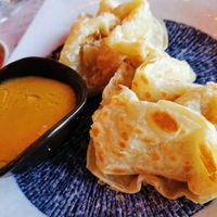 Roti Canai - fluffy flatbread served with vegan curry sauce at Wok Inn in Blackpool