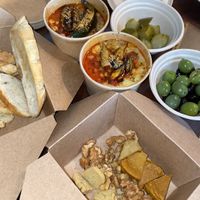 Corn risotto and cheese plate  at Althea in Chicago