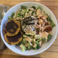 Vegan sushi bowl w/ Sweet potato quinoa cakes  at Restoration Cafe in Manchester