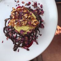 Vegan dessert of the day: date based tarte with orange cashew filling and crunchy caramel  at HOOPS in Mandrem