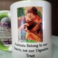 Mugs are available with a rendering of Earthling Ed, hugging a bovine sister
775-460-3969 at Divine Grace Healing Retreats in Reno
