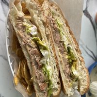 Cuban sandwich with plantain chips (included)  at Vegan Cuban Cuisine in Miami