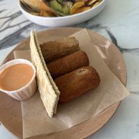 Croquetas! The two that look alike are the ham and cheese and the third is the chickpea   at Vegan Cuban Cuisine in Miami