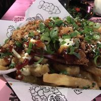 Delicious loaded fries! A bit over cooked but the toppings were amazing  at Vegan Junk Food Bar - Downtown in Amsterdam