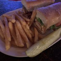 vegan chicken tender (hot bbq) sub with fries, mmm  at Milkie's Elmwood Lounge in Buffalo