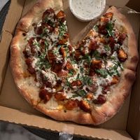 Buffalo cauliflower pizza with a side of ranch   at Julie Goes Green in Los Angeles