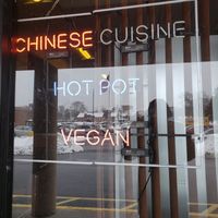 Neon VEGAN sign in the window! at Super Bowl Cuisine in Kingston