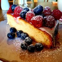 Lemon tarte with berries 😍 at Marny's in Dusseldorf