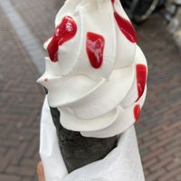 Oatly soft serve in cone with raspberry coulis for €3.50. The coulis (€1) was nothing special, but the cone was crispy and the soft serve was creamy and smooth. at STACH food in Utrecht