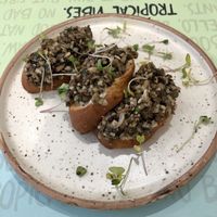 Mushrooms in garlic mayo on toast! at Nut and Bowls in New Delhi