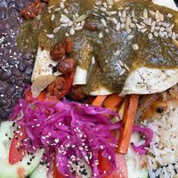 Vegan enchiladas, green sauce (red is better), filling with vegetables and vegan chorizo, amazing!  at Arte Sano in Holbox