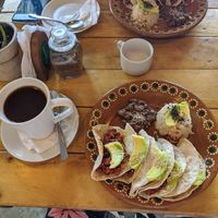 Vegan chorizo tacos with avocado and sesame seeds and coffee with coconut milk at Arte Sano in Holbox