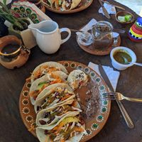 Vegan Chorizo tacos and vegan Al pastor tacos with chickpeas on the side with black beans and rice. Simply delicious! at Arte Sano in Holbox
