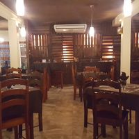Inside & outside dining with bar at Erva's in San Ignacio