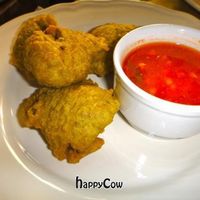 Vegan bada (lentil croquette) served with tomato sauce. Yum!  at Bibliothe in Rome