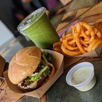 Crispy "CHK" Burger! With some curly fries and the Green Power -7 smoothie at The Dragonfly in Ocala