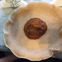 Miser wet - red lentil mixed with berbere prepared with onion and garlic  at Addis Abeba in Footscray