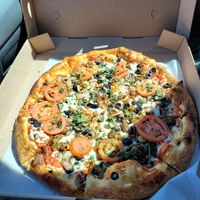 Roma Tomatoes, Tempeh, Olives, Mushrooms, Basil, Chives and Vegan Cheese  at Mellow Mushroom - temporarily closed in Bristol