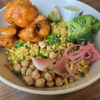 Buffalo Cauliflower Bowl with Grains  at Grass Roots Kitchen in Tarrytown