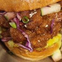 Garlic Vegan Chicken with Red Cabbage, Green Onion,Avocado Cilantro Aioli. Chicken is Soy Curls at Grass Roots Kitchen in Tarrytown