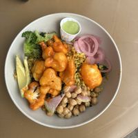 Buffalo cauliflower bowl with grainss  at Grass Roots Kitchen in Tarrytown