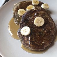 Blueberry vegan pancakes with bananas  at Grass Roots Kitchen in Tarrytown