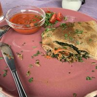 Spinach and mushrooms crepe (gluten free) with tomato sauce  at ŁUBU DUBU in Gorzow Wielkopolski