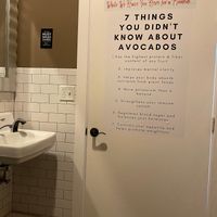 Bathroom door extolling the health benefits of avocado  at The Remedy Exchange in Wakefield