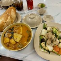 Vegetarian (but vegan!) curry with a portion of sautéed vegetables  at Bo De Quan in My Tho