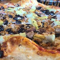 Vegan pizza with veggies and tempeh at Mellow Mushroom in Chantilly