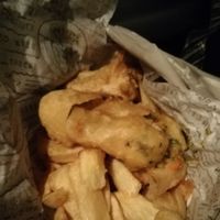 Deep fried veggie sausage and chips at Gino's Fryer  in Largs