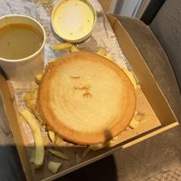 Pizza supper with curry sauce   at Gino's Fryer  in Largs