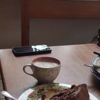 Chocolate cake and Rice milk cappuccino at Patchwork in Foix