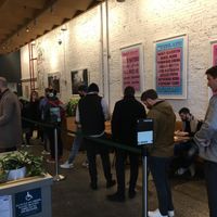 The line for ordering food; you can see some seating and tables along the wall at sweetgreen - NoMad in New York City