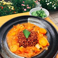 Tofu and Tomato Stew (daily special) with mustard greens at Prana Center in Da Lat