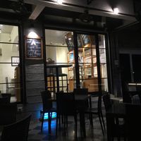 The outside sitting area at August Cafe in Mumbai