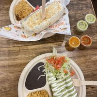 Burrito and flautas with sauces  at Nissi Vegan in Austin