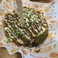 Carne asada fries. Very goodd  at Nissi Vegan in Austin