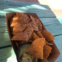 Chips with a side guac at Nissi Vegan in Austin