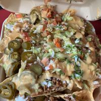 Fully loaded nachos! at Nissi Vegan in Austin