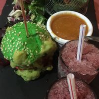 Small red bean burgers, sangria, salad, chutney, and chips at Taberna De Nino in Lanzarote