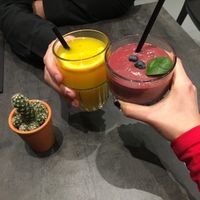 Fresh orange juice and avocado berry smoothie at The Avocado Show in Brussels