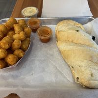 Flavor bomb pho dip and tots  at St. Veg in Rockville