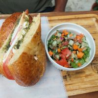 Vegetarian sandwich with arugula and salad at The Open Kitchen in Monteverde